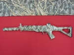 The best custom paint jobs you'll find anywhere. Everything is hand painted and sealed with a special scratch resistant coating. No patterns, stencils, or decals were used: Mossy Oak Sig 552