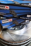 Front & rear R1 Concepts Eline Series slotted brake rotors and Hawk HPS front & rear brake pads ready to be installed